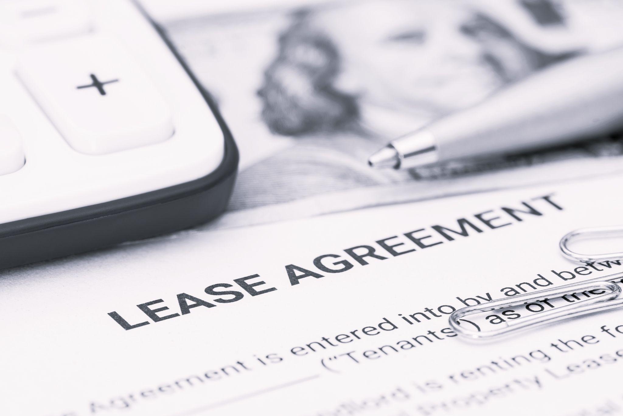 Renter signing lease agreement