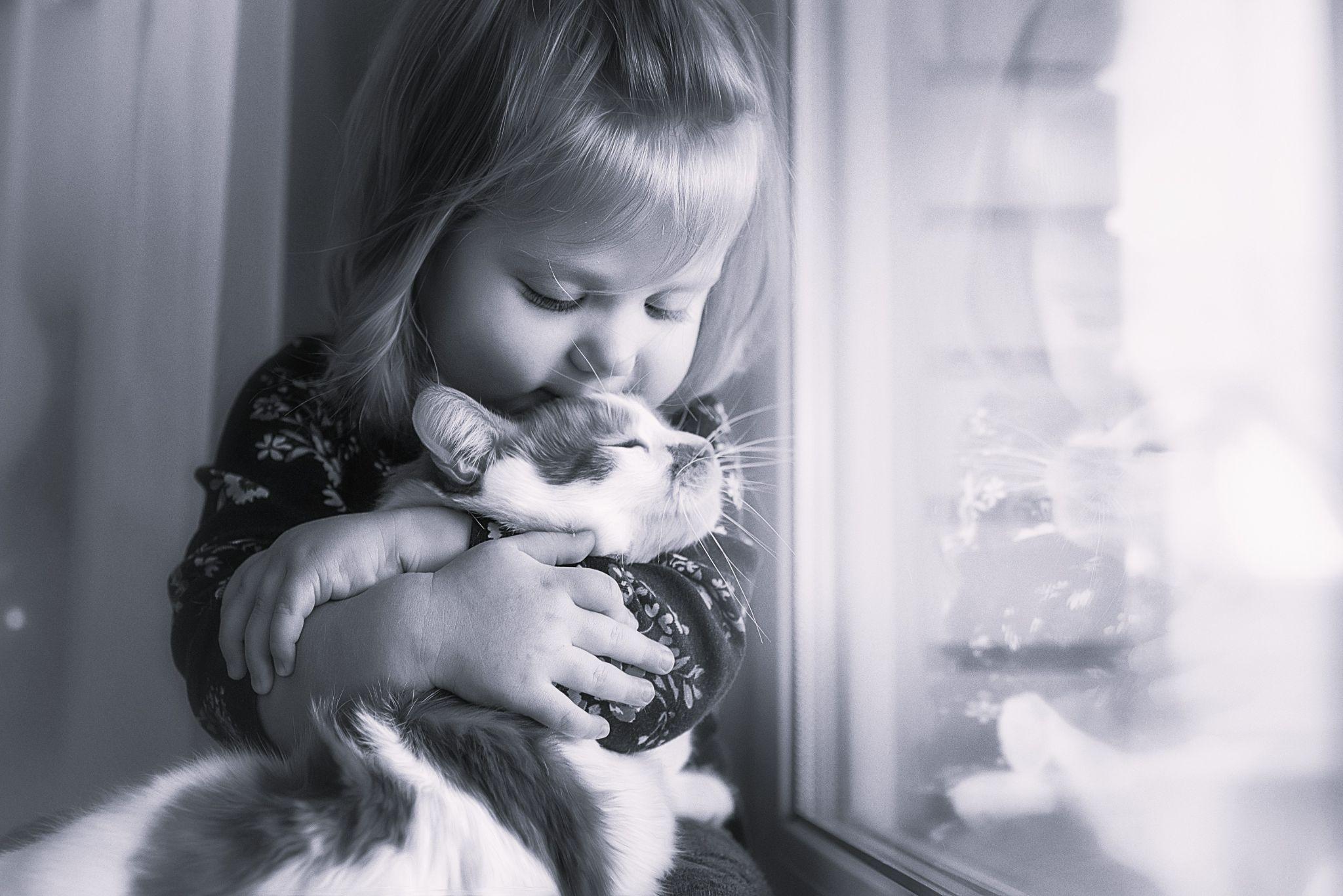 Little girl with her cat