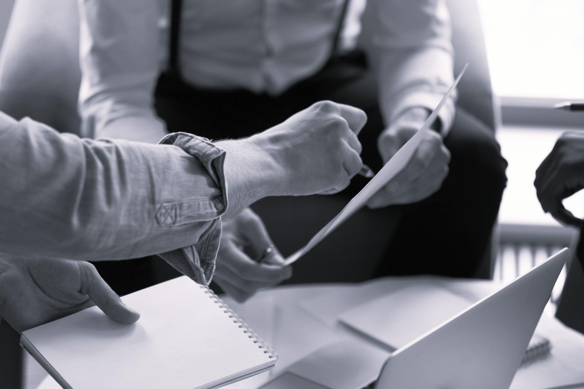 Property manager going over expectations written in a contract with a new tenant