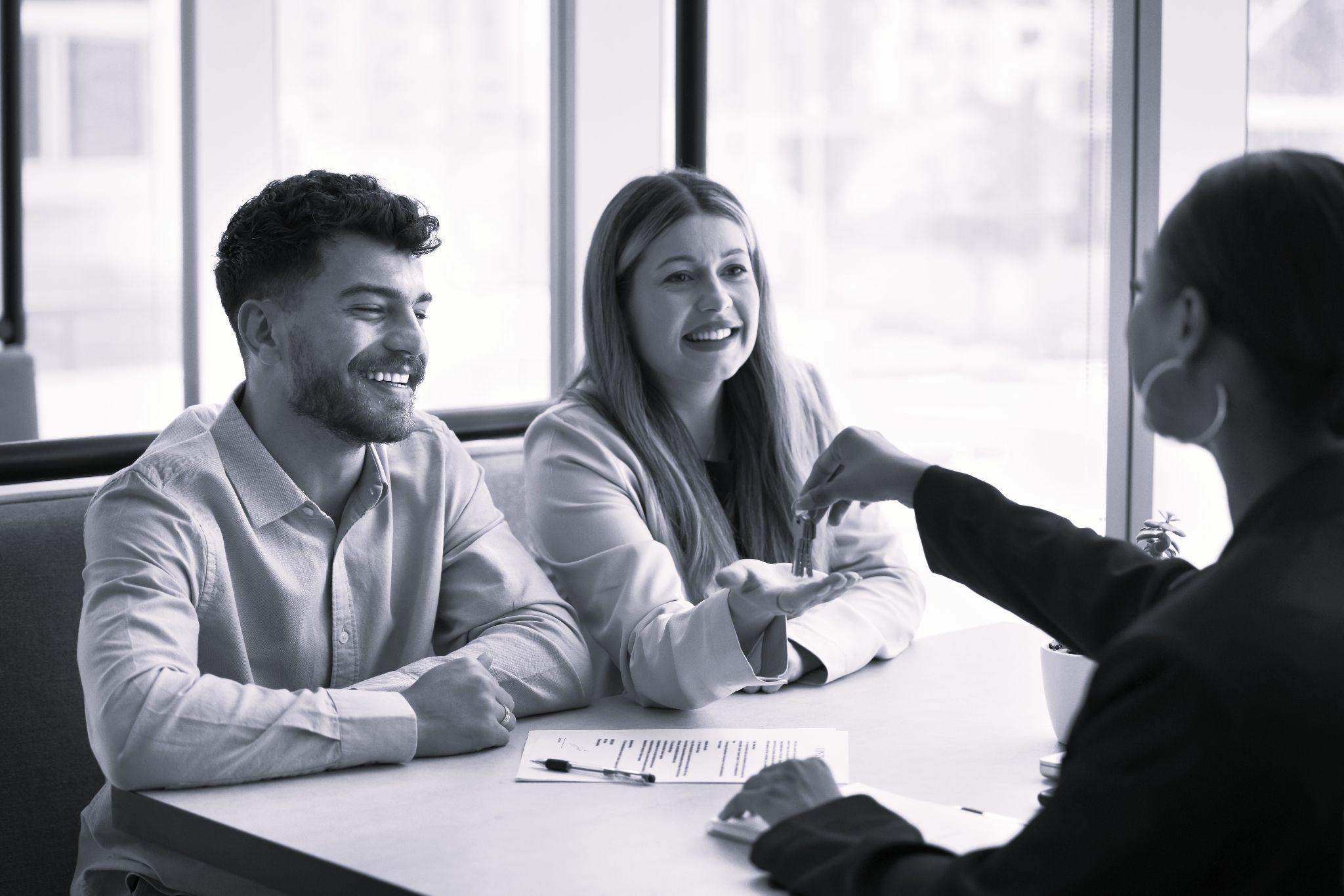 A landlord talking to new tenants