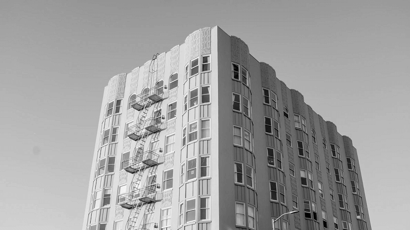 beige concrete building under blue sky during daytime