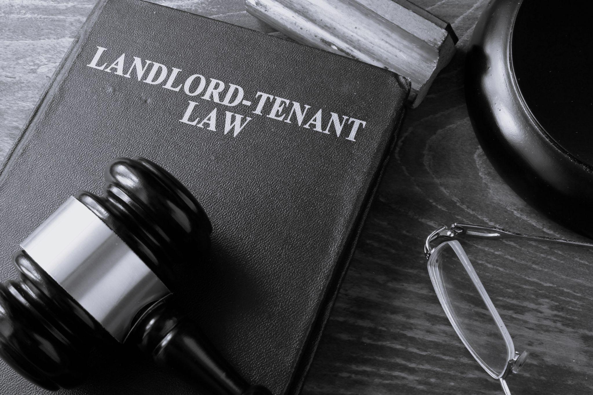 Book with title Landlord-Tenant Law and a gavel.