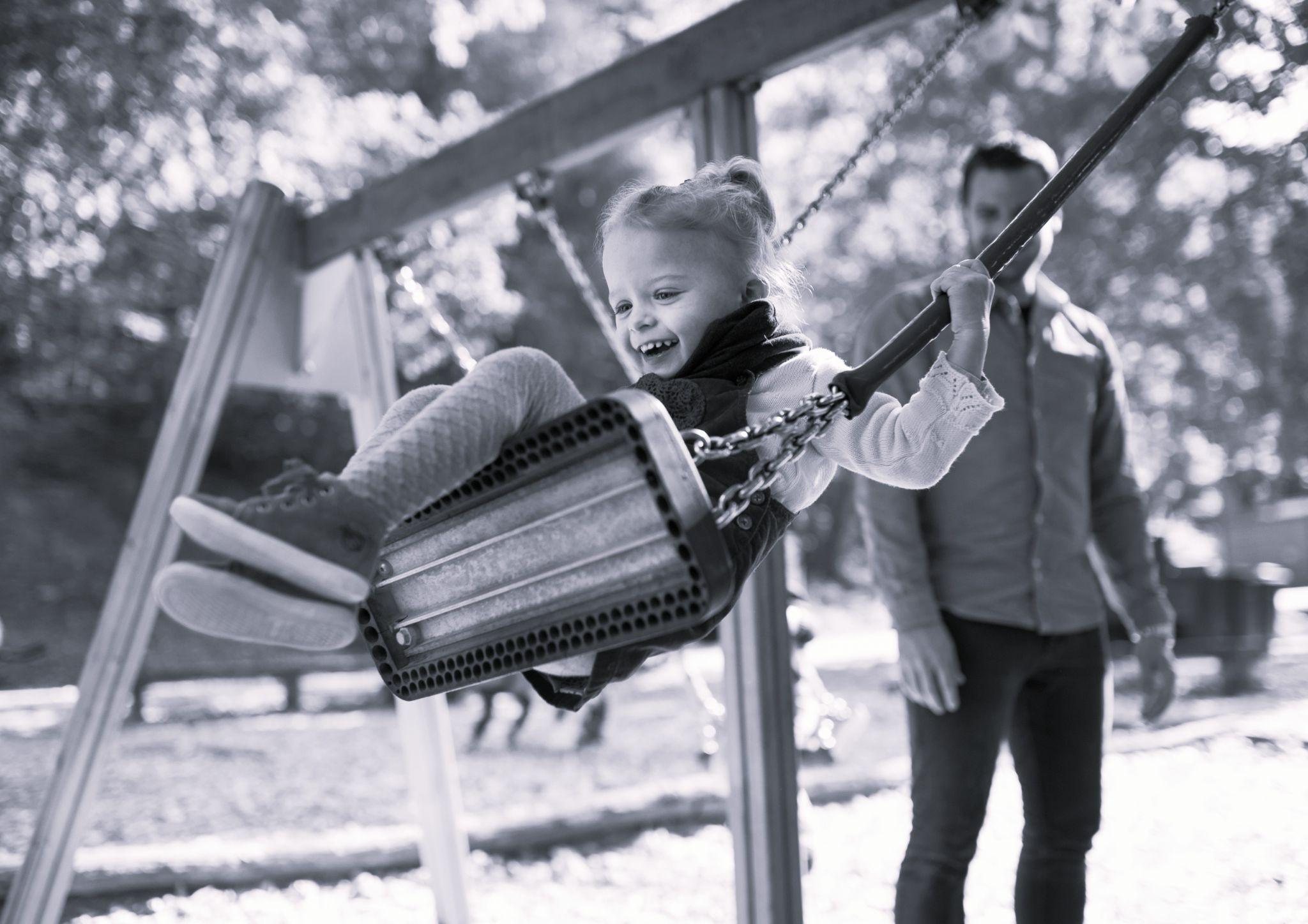 Family enjoying a rental property with a playground
