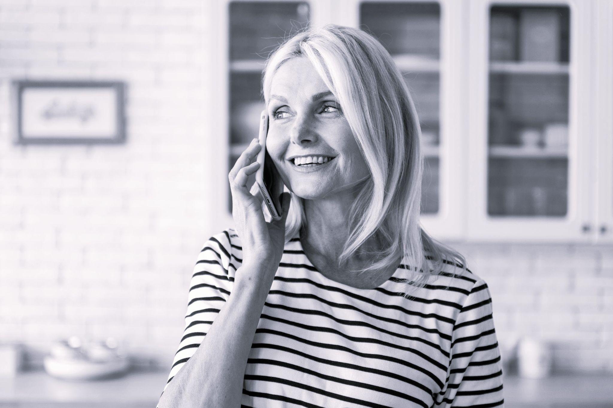 Renter talking to her landlord on the phone