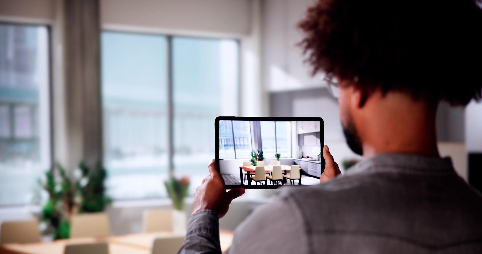 Property manager taking a photo of a property