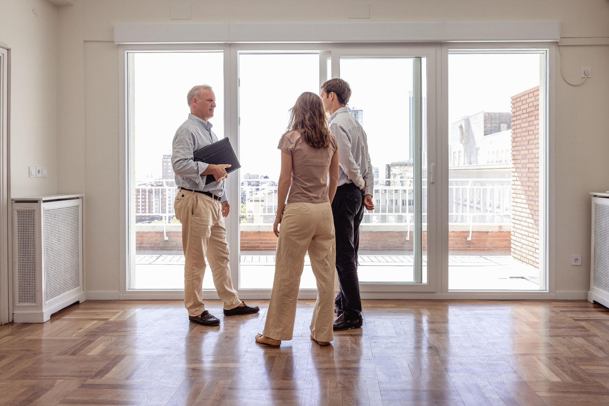 A property manager giving interested renters a tour