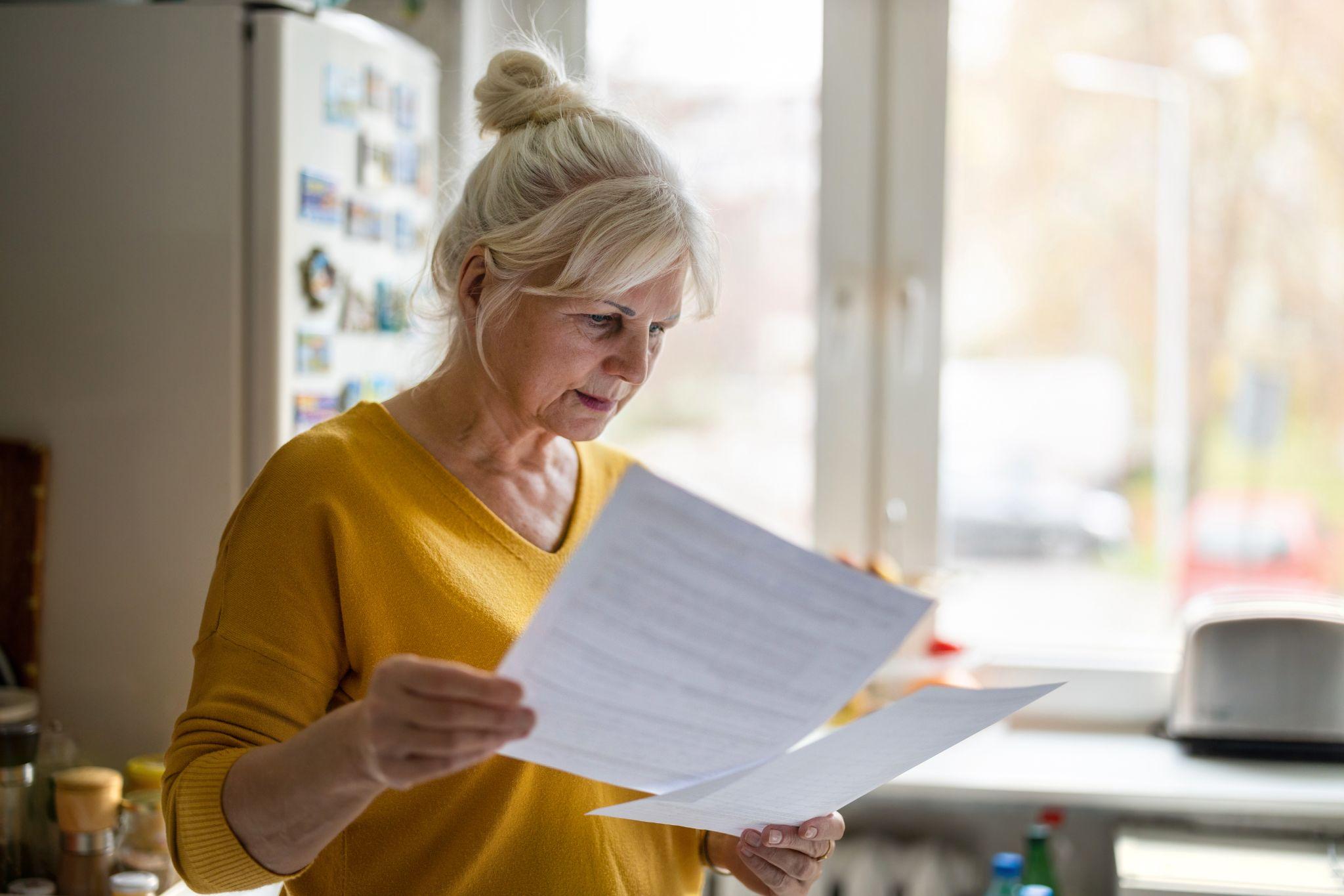A renter looking over her lease paperwork
